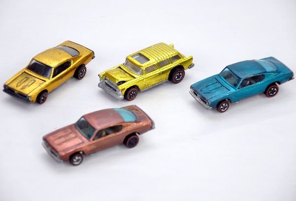 4 Mattel Hotwheels Redline Vehicles: All clean including 3 different Barracudas & a Nomad wagon. All show light to moderate playwear, C7