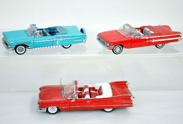 3 1/24 Scale Automobiles: Includes Danbury Mint 1958 Chevy Belair convertible; Danbury Mint 1959 Cadillac 62 convertible; both show light signs of wear, C8-8+; Franklin Mint 1960 Chevrolet Impala convertible with 2 paint chips