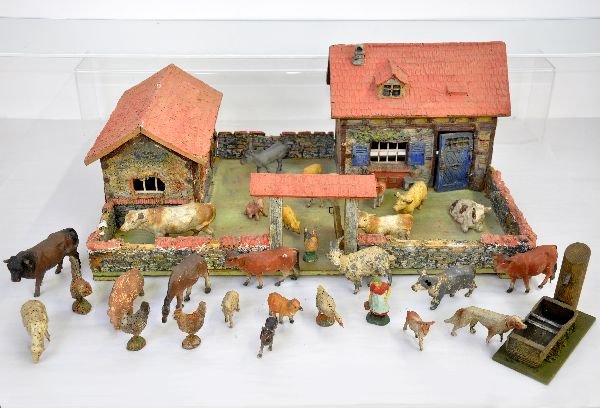 FAO Schwarz Farm Set: Circa 1933 original owner piece. European Import, possibly Elastolin or Rock & Groener. Hand painted composition applied over wood structure with 29 composition animals and accessories with some crack