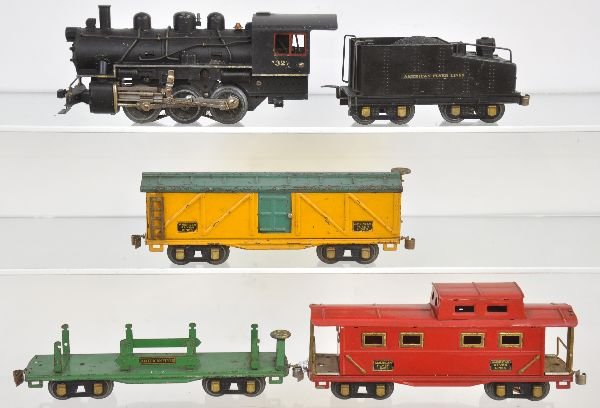 5Pc American Flyer Switcher Set: First version with 429 decaled loco; 4320 slope back tender with curly Q coupler; 3206 machine car; 3208 boxcar; 3211 caboose. All show moderate playwear, C5-6