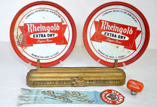 Vintage Beer Advertising Items: Includes 2 heavy gauge tin Rheingold beer trays, one has some rust; Schaefer tap handle; Pabst Blue Ribbon ribbon, silk is worn; plus a gold painted diecast Anheuser-Busch illuminated sign base. All s