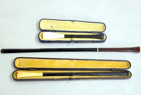 3 Meerschaum & Ebony Cigarette Holders: Includes a 4 1/2 & 7 3/4" holders, with Meerschaum tips & ebony Bakelite handles. Both have hard cases marked MM Importing NY. Plus a 10" holder with ebony Bakelite handle, Ivory ring & amber tip. All