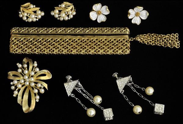 Vintage Signed Costume Jewelry Lot: Includes a Napier comb in gold holder; Vendome pearl dangle earnings with rhinestones; Trafari earring & pin set; Trifari flower earring. All show light signs of use & age. Examine photos, or call for