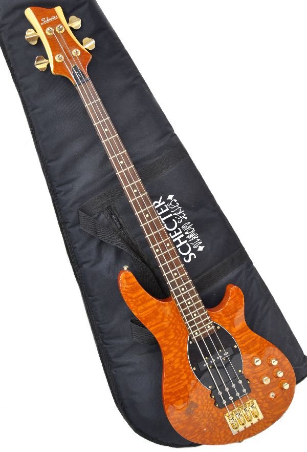 Schecter CV-4 Electric Bass Guitar: Diamond Series with HCS set-up, Serial 0620486. Made in South Korea. 3-tone curly red maple body with black maple neck & blonde back, Duncan pick-ups. Unusual finish, showing light wear with matching 