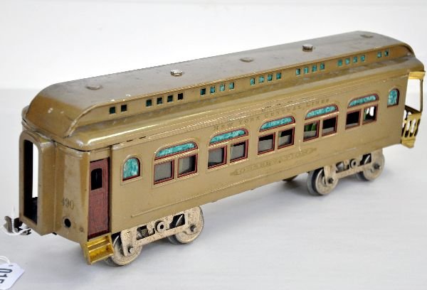 Lionel 490 Observation: ST Ga. Early version with single eyelet trucks & combination coupler. Ding in rear roof corner with maroon trim. It is fairly clean & shiny, otherwise showing light to moderate playwear, C6