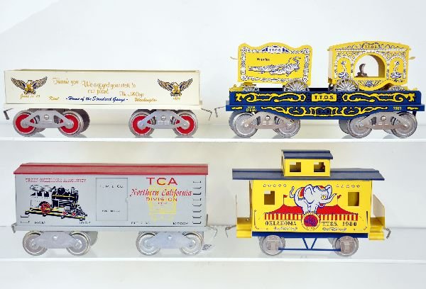 Mc Coy Club Cars: ST. Ga. 1974 McCoy plant tour gondola; 1004 -1968 TCA convention; 1981 TTOS flat with reptile cages, wheels starting to explode; 1980 TTOS caboose, journal boxes are solid. Otherwise shows light wear,