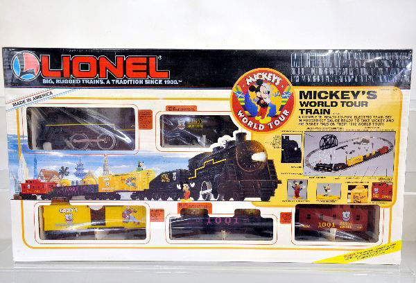 Lionel 11721 Mickeys World Tour Set: Includes a ready to run steam loco, tender & 3 Disney cars, track & transformer, all factory sealed in its set box, C10