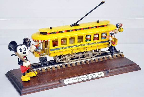 Pride Lines Mickey Mouse Tencenial Trolley: Dated 1981 and is complete with large Mickey, hanging Goofy with balloons & display board. It is unrun, just a bit of dust, C8+