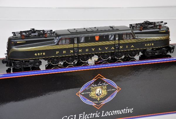 Lionel JLC Series 18355 PRR GG1: 054. Nice scale GG1 with all the features. It shows light run time with box, C8+
