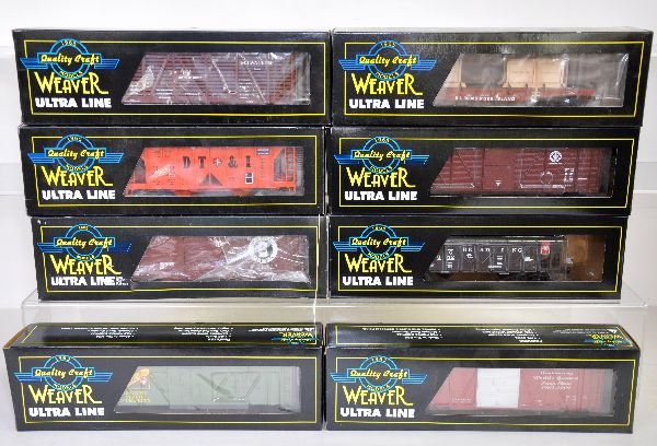 8 Weaver Ultra Line Freight Cars: Includes 2049 boxcar; 37352 hopper; 80003 hopper; 6500 boxcar; 110679 stock car; 90088 flat with crates; 4602 reefer; TCA PS1 boxcar. Most appear unrun with boxes, C8+-9