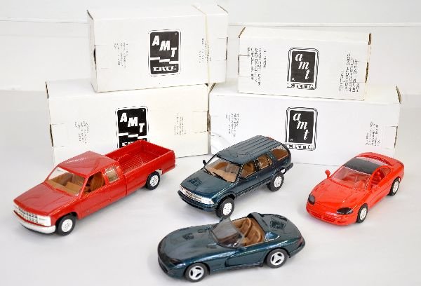 4 Boxed AMT Dodge & Chevy Promo Vehicles: Includes 1993 Chevrolet C-1500 extended cab, victory red & 1996 Blazer, emerald green; 1995 Dodge stealth, red & 1995 Viper RT/10, emerald green pearl coat. All are new in boxes, 2 boxes worn, C9+