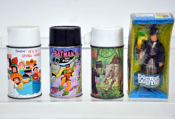 Lunchbox Thermos Lot, Plus: Thermoses include 1967 Dr Doolittle; 1966 Batman & Robin; 1964 Disneyland's it’s a Small world; Plus a Mint Boxed Marx Dr Doolittle figure, thermoses are clean, showing light wear, C7-7+