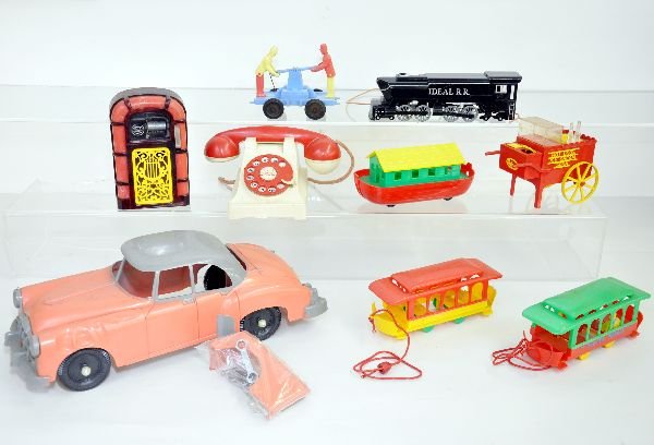 9 Ideal Hard Plastic Toys: Includes a 14" fix-it coupe with accessories & tools; telephone; 2 different trolley cars; train; food cart (incomplete); Juke box, music box & bank, functional & house boat. Otherwise all a show ligh