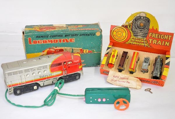 2 Boxed Marx Train Toys: Includes a Ranger-like, 5pc freight train, mechanism is functional with key, bag & display box; Line Mar SF diesel battery toy, 10" litho tin, mechanism mostly functions with forward & reverse with wh