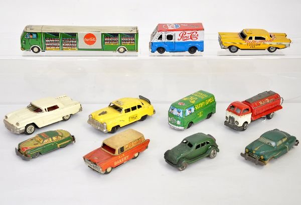 11 Japanese Tin Vehicles: Longest is the 9" Coca-Cola truck. Nice assortment including an Edsel taxi; Pepsi Cola Metro van; Pre war Chrysler Airflow & more. Grade range is C5-7, so examine photos closely
