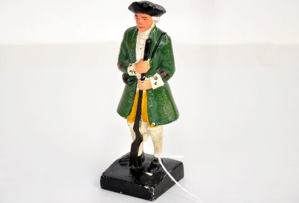 Cast Iron Colonial Soldier Doorstop: Probably by Hubley, circa 1920. it is 8" tall and has great original paint. There are a few small touch-up spots, but is a nice example of this stop, C7