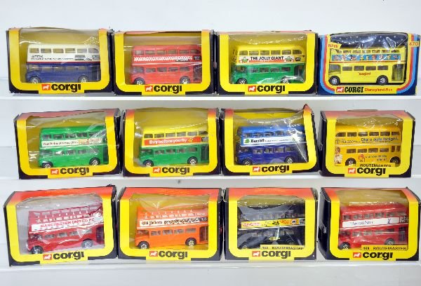 12 Boxed Corgi Buses: Includes 11 different 469 London buses & a 470 Disneyland bus. Vehicles appear new in shop worn boxes, C9