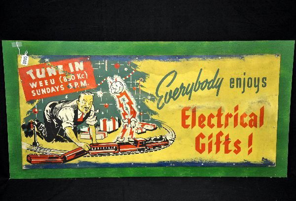 Scarce Reddy Kilowatt Christmas Poster: 44X20" litho on heavy cardboard, mounted(17 screws) to 1/2 sheet of 1/4" plywood. Great image, co-sponsored by WEEU Radio(Reading, PA). It even has a toy train set! Color is bright, but photos show th