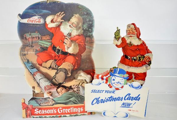 3 Vintage Christmas Diecuts, Coca-Cola: Classic 16X24" easel back Coke display showing Lionel trains and a child dreaming, shows wear, but nice color; 15: Santa diecut & 10 1/2X13" snowman diecut from Gibson Greeting cards. Small pieces are