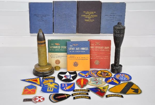 WWI & WWII Military Lot: Includes 1917 Infantry manual; 1917 Field service regulations; 1917 Drill regulations & 1917 Sanitary Troops Drill & regulations; 1918 37mm shell, mounted & drilled as a lamp base; Unusual M-11 Practi