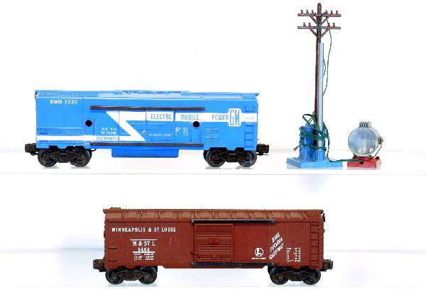 Nice Lionel 3530 & 6464-50 Freight Cars: 3530 operating generator car, best version with long stripe, blue tanks & pole base; 6464-50 M&StL boxcar, type I body. Both show very light wear, C8+