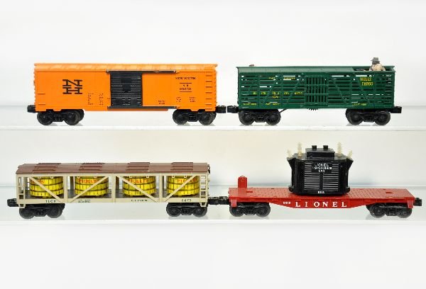 4 Lionel Freight Cars: Includes a 6818, 2 insulators repaired; 6475 Pickle vat car, steps intact, frame has light rust spots; 3470 Sheriff & Outlaw, figure paint, 20%; 6464-725 NH boxcar. All otherwise show light to moderat