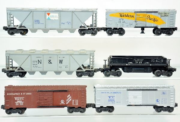 6 Lionel Freight Cars: Includes 6464-175 RI, type I with bright silver, light disturbance on Rockets lettering one side; 6346 Alcoa quad hopper, 1 sticker reattached; 3474 WP operating boxcar; 3469 coal dump; 6464-50 M&StL
