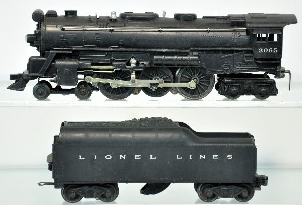 Lionel 2065 Steam Locomotive: Fairly clean with heat stamped lettering; 2046W tender with rust from flux on frame. Otherwise show light to moderate playwear, C6+-7