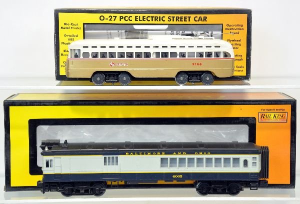 MTH RailKing Doodlebug 30-2134-1 & Street Car 2503: Doodlebug comes equipped with ProtoSound and has very nice paint and has been moderately run. Philadelphia Septa PCC Electric Street car is dirty throughout and shows considerable playwear shows run t