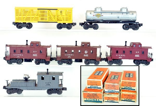 6 Boxed Lionel Freight Cars: Includes a 2420 searchlight work caboose, small chip in 1 toolbox; 6457 caboose; 6465 tank car; 2 #6357 cabooses, 1 has -25 box; 6656 stock car, all otherwise show light playwear with boxes, C7-7+