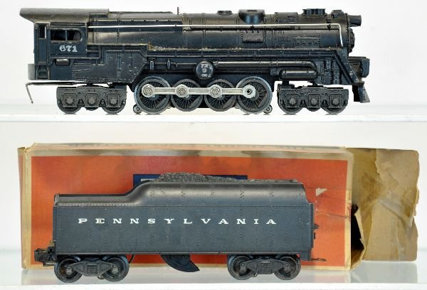 Lionel 671RR Turbine: 1952 production, second version with 671 lettering, missing rear steps; 2046W-50 PRR tender with worn box. Both show light to moderate playwear, Otherwise C7