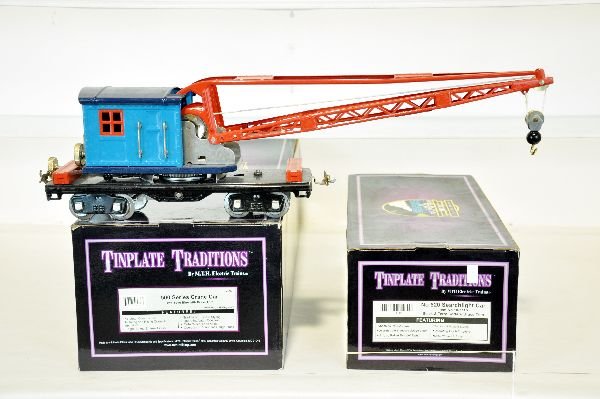 2 Boxed MTH 500 Series Freight Cars: ST Ga. Includes a 10-2007 crane; 10-1115 searchlight car, terra-cotta. Both show light runtime with near perfect finish & boxes, C9