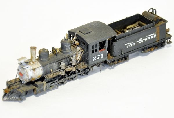 Boxed Key HOn3 Brass 2-8-0 Locomotive: Lettered Rio Grande #271. Professionally painted & decaled with light runtime. It is missing its coal pile cover, otherwise shows very light runtime with nice weathering and near perfect paint with bo