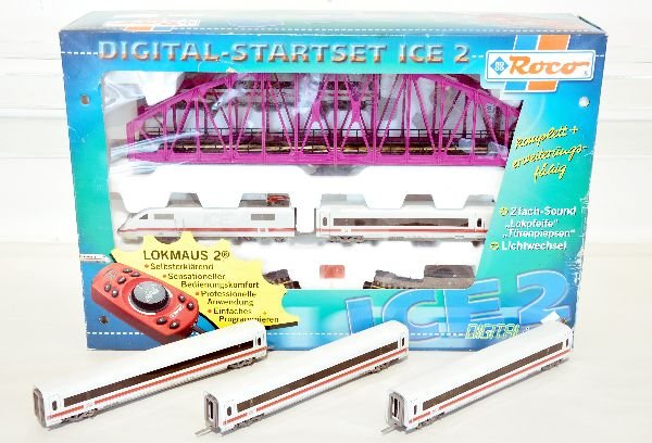 Boxed Roco Extended HO ICE Streamliner: Includes 412036 3-car starter set. Includes some track & bridge with set box, instructions, no transformer, plus 3 add-on cars. All show light playwear with set box & inserts. Examine photos closely