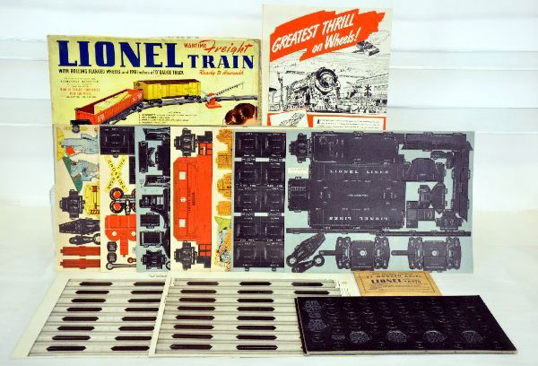 Boxed Lionel 50 Paper Train: 1943 war production. Diecut cardboard, makes up a set similar to the 843W set of 1941-2. The contents are complete, unpunched with its packet & instructions. The box has minor tape repair and wear
