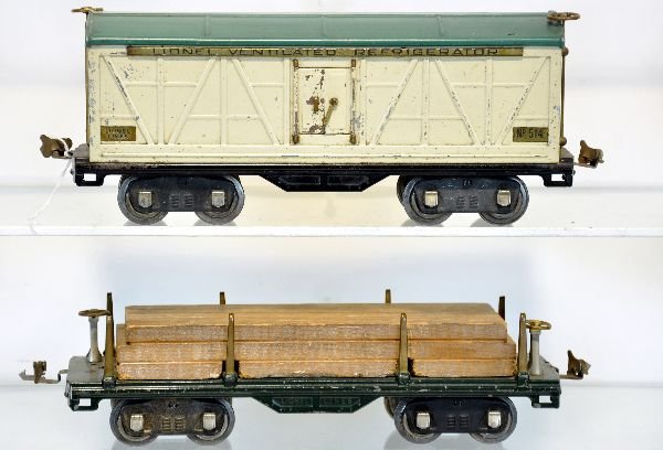Lionel ST Ga 514R & 511 Freights: Includes a 514R reefer, early colors with some flaking on doors, mostly inside; 511 late lumber car with load. Both otherwise show light to moderate playwear, C6+-7