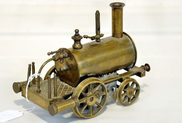 Modern Bassett-Lowke Style Live Steam Locomotive: 2 3/8" gauge 2-2-0 loco. Unpainted brass with its burner. It was made in the last 30 years in the style of pre war locos. It shows light playwear, C8