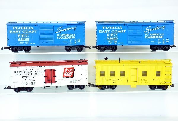 4 USA Freight Cars: G Ga. Includes a 8240 SOO reefer; 2 # 21020 FEC boxcars; 1841 PRR kitchen car, all need a light cleaning and are missing some trim pieces. They show light runtime, otherwise C8