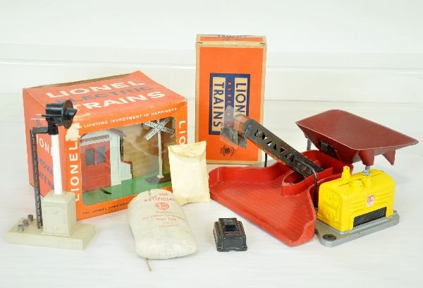 3 Lionel Accessories, 2 Boxed: Includes a scarce window boxed 145 gateman with insert; 253 block signal with packet, both C8; 397 coal loader with early yellow painted motor cover on later accessory with 456 bin & posts, 364 & 206.