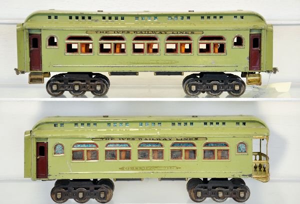 2 Lionel Ives Transition Cars: ST Ga. Includes a 418 Pullman & 490 observation. They are light green with decals over top lettering with Ives paper oil labels. They are clean & shiny, showing moderate playwear, C6-