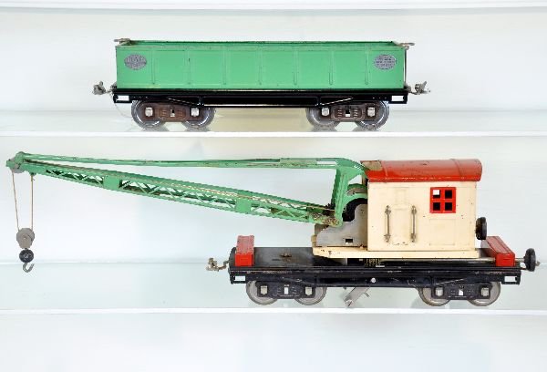Late Lionel 212 & 219 Freight Cars: ST Ga. Includes a 219 crane, scarce late colors with nickel trim & black knobs. It needs a detailed cleaning, but only shows light to moderate playwear with solid gears, working; 212 gondola with nick