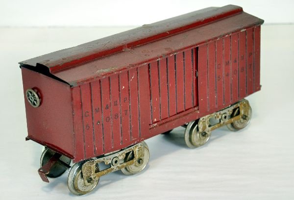 Scarce Lionel Red 14 Boxcar: ST Ga. This is the last version CM&StP with painted bottom & black rib detail. It is unusually clean & shiny, showing light playwear, C6 Nice example
