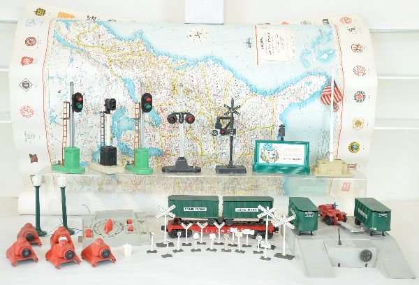 Lionel Accessory Group: Includes a 460 piggy-back platform set with 2 extra trailers; 920 map for your wall; 2 #76 lampposts; 89 flag pole; 413 control panel; 2 #153 block signals; 4 #260 bumpers, C6+; 140 banjo signal; 154 