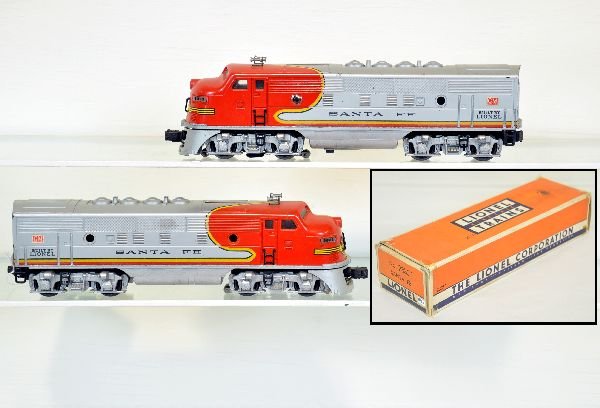 Early Lionel 2333 SF F3 AA Diesels: 1st production with rubber stamped lettering & large GM decal above built date. They are clean and matching with usual decal chips at door frames and missing 5 lenses. The battery box is clean and has