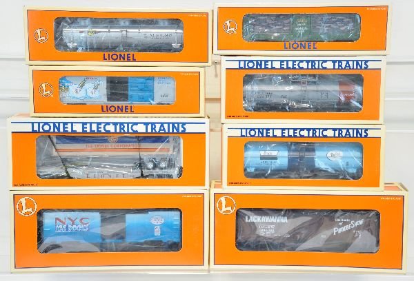 8 Lionel Freight Cars: Includes 16742 aquarium; 16140 tank; 16142 tank; 16152 tank; 19832 ice car; 16924 trailer flat; 16767 ice car; 29260 boxcar. They show light runtime with C9 bodies & boxes