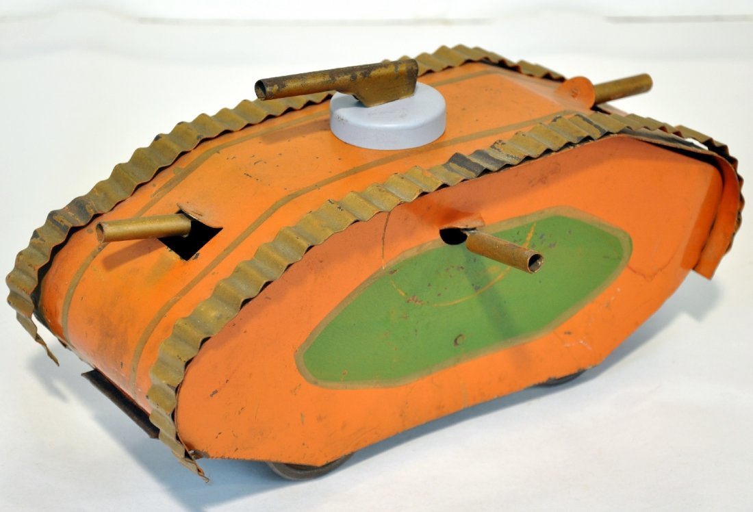 Unusual Dayton Friction WW1 Tank: Hand painted pressed steel, 13" long. All guns are present with a replaced top turret base that isn't mounted. It has better than average paint, C7