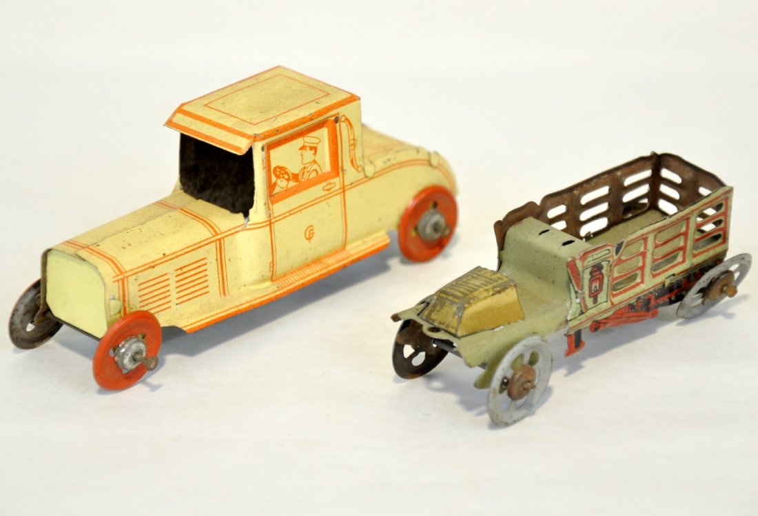 2 German Nickel Toy Vehicles: Includes a 4 1/4" Gunthermann coupe & an early Gesch stake truck, missing driver. Both are clean, C7-8
