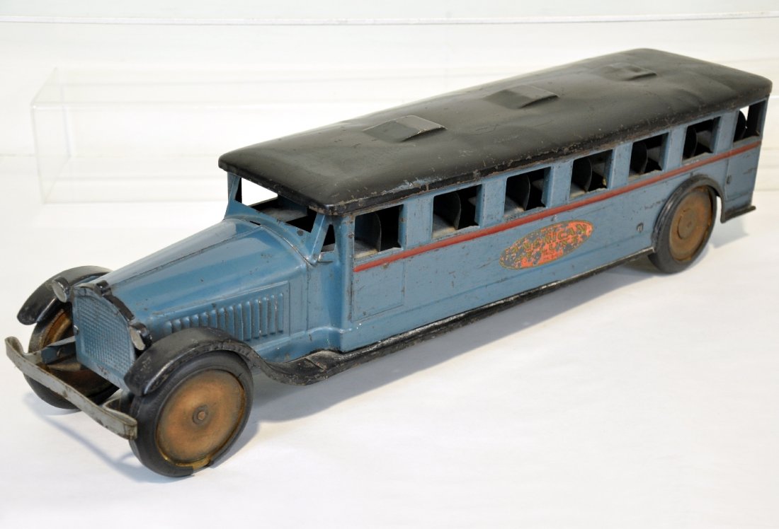 Restored Dayton Friction American Deluxe Bus: Painted pressed steel, 27" long, with 75% decals. It has nice original paint, showing light to moderate playwear, C7