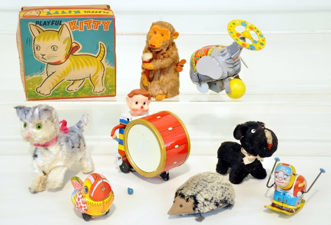 8 Small Japanese Wind-up Toys: Includes a 5" boxed Alps Playful Kitty; Daiya Drummer Boy; Yone Circus elephant; Hiro Skier & 3 plush animals. All are functional & show light playwear, C7-8