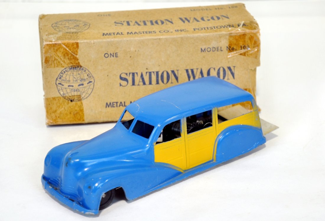 Boxed Metal Masters 1940s Buick Woody: Unusual 9" diecast 1947ish Buick Woody Wagon. Model 100. It is clean with functional wind-up mechanism. It shows light playwear with incomplete box, clean C7
